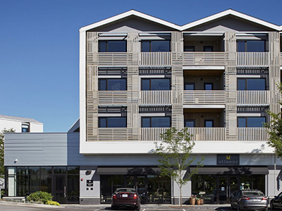 Multifamily building with SWF manual roller shades